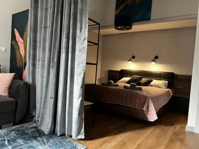 Łóżko lub łóżka w pokoju w obiekcie “ApartCalm - like at Home” – close to Subway
