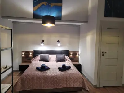 Łóżko lub łóżka w pokoju w obiekcie “ApartCalm - like at Home” – close to Subway