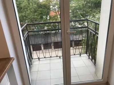 Balkon lub taras w obiekcie Cozy Apartment near Łazienki Royal Park