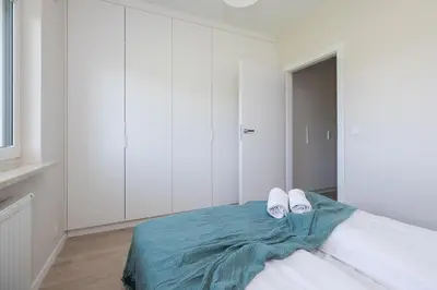 Łóżko lub łóżka w pokoju w obiekcie ShortStayPoland Pohulanka (B85)