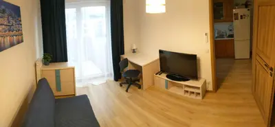 Telewizja i/lub zestaw kina domowego w obiekcie OCTAVIAN SUITE