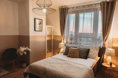 Łóżko lub łóżka w pokoju w obiekcie ClickTheFlat Gdański Center Prestige Apart Rooms