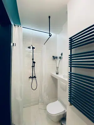 Łazienka w obiekcie 1 Bedroom Apartment 3 minute walk to Wilenska Metro