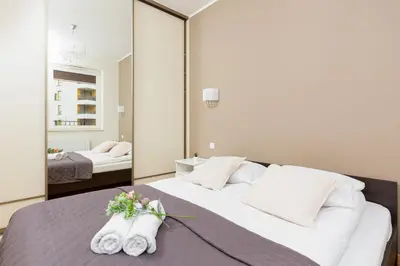 Łóżko lub łóżka w pokoju w obiekcie Kolorowy Gocław Apartment by Noclegi Renters