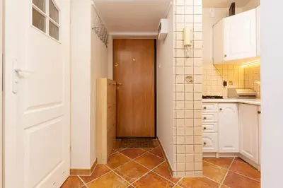 Kuchnia lub aneks kuchenny w obiekcie Studio Apartment Mokotów Malawskiego by Noclegi Renters