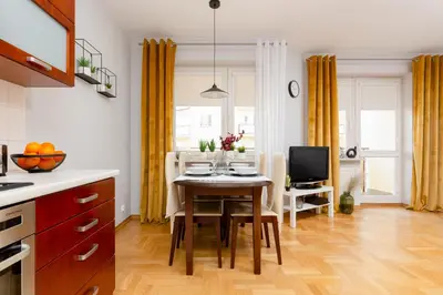 Kuchnia lub aneks kuchenny w obiekcie Mokotów Apartment Bluszczańska by Noclegi Renters