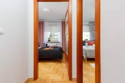 Łóżko lub łóżka w pokoju w obiekcie Mokotów Apartment Bluszczańska by Noclegi Renters