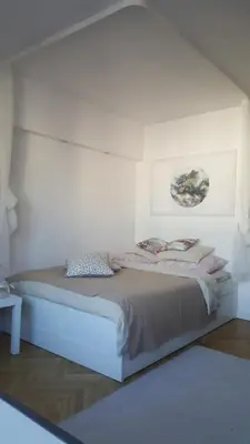 Łóżko lub łóżka w pokoju w obiekcie Apartament Chmielna
