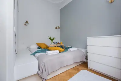 Łóżko lub łóżka w pokoju w obiekcie ShortStayPoland Orla B61
