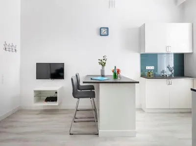 Kuchnia lub aneks kuchenny w obiekcie Wspólna 54 - Blue - Good Apartments