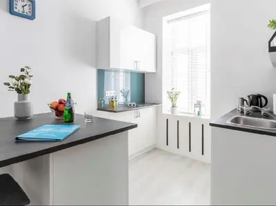 Kuchnia lub aneks kuchenny w obiekcie Wspólna 54 - Blue - Good Apartments