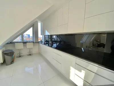 Plan piętra w obiekcie Penthouse 2 Bedroom Designer Apartment