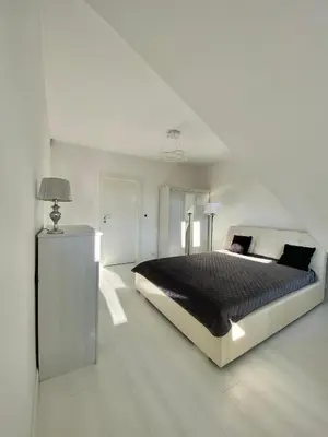 Łóżko lub łóżka w pokoju w obiekcie Penthouse 2 Bedroom Designer Apartment