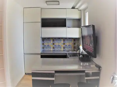 Kuchnia lub aneks kuchenny w obiekcie Ambassador Apartament