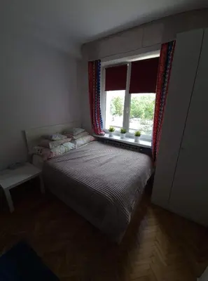 Łóżko lub łóżka w pokoju w obiekcie Apartament Waszyngtona