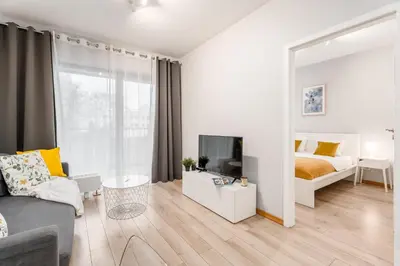 Telewizja i/lub zestaw kina domowego w obiekcie Arkadia City Apartments