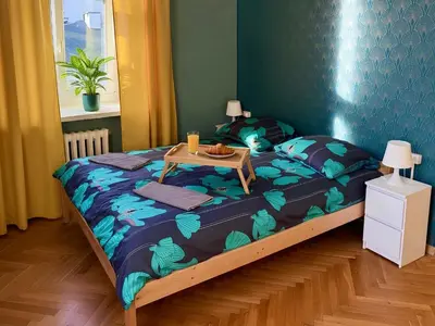 Łóżko lub łóżka w pokoju w obiekcie Hostel Oliwka - Metro Świętokrzyska