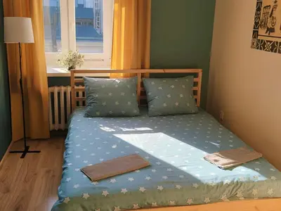 Łóżko lub łóżka w pokoju w obiekcie Hostel Oliwka - Metro Świętokrzyska