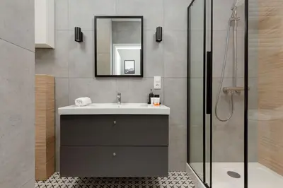 Łazienka w obiekcie Central Apartment Emilii Plater by Noclegi Renters