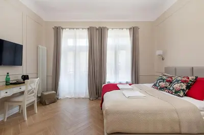 Łóżko lub łóżka w pokoju w obiekcie Lwowska 9 - Intimate & Comfortable Studio by Noclegi Renters