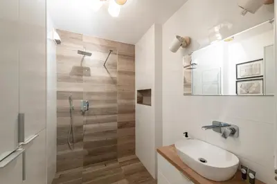 Łazienka w obiekcie Waw Apartamenty Manhattan