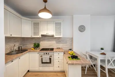Kuchnia lub aneks kuchenny w obiekcie Waw Apartamenty Manhattan