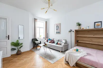 Łóżko lub łóżka w pokoju w obiekcie SuperApart Krucza 47a