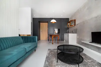Część wypoczynkowa w obiekcie Wola Artistic Designer Apartment by BookingHost