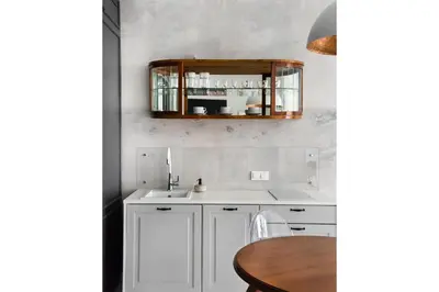 Kuchnia lub aneks kuchenny w obiekcie Wola Artistic Designer Apartment by BookingHost