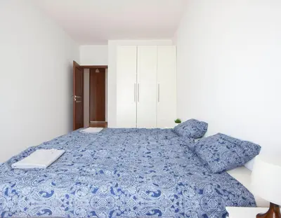 Łóżko lub łóżka w pokoju w obiekcie Waw Apartamenty Wilanów Branickiego