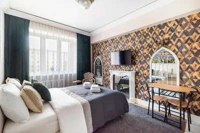 Część wypoczynkowa w obiekcie City Centre All In One Apartment by BookingHost