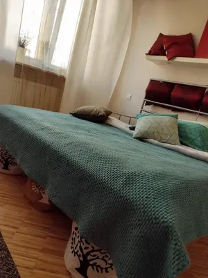 Łóżko lub łóżka w pokoju w obiekcie TOtuTOtam