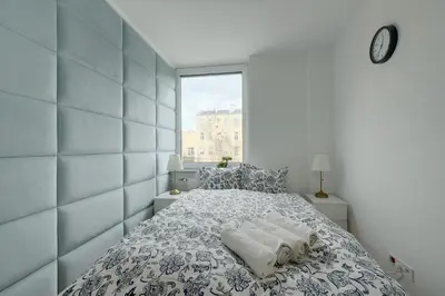 Łóżko lub łóżka w pokoju w obiekcie Luxurious 3BR APT Center
