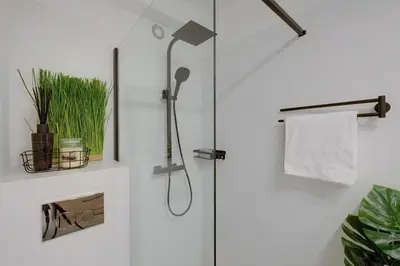 Łazienka w obiekcie Luxurious 3BR APT Center