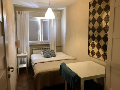 Łóżko lub łóżka w pokoju w obiekcie Apartament Słodowiec