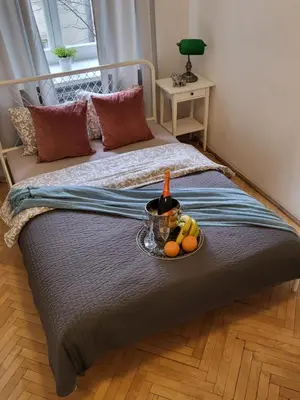 Łóżko lub łóżka w pokoju w obiekcie Apartamenty - MI OLD TOWN ŚWIĘTOJAŃSKA