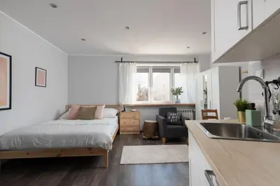 Łóżko lub łóżka w pokoju w obiekcie Nowolipki Cozy Studio