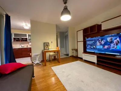Telewizja i/lub zestaw kina domowego w obiekcie New HALA WiFi 70’TV Netflix HBO Max AppletTV+