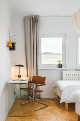 Łóżko lub łóżka w pokoju w obiekcie Warsaw Concierge Eclectic Design