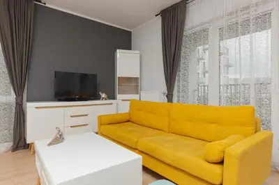 Telewizja i/lub zestaw kina domowego w obiekcie Active City Apartments Warsaw by Noclegi Renters