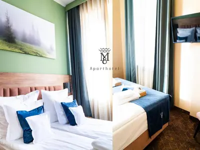 Łóżko lub łóżka w pokoju w obiekcie Mariensztat 8 Hotel