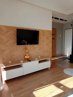 Telewizja i/lub zestaw kina domowego w obiekcie Aura Sky Ostrobramska Prestige