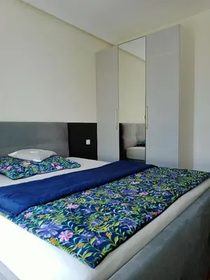 Łóżko lub łóżka w pokoju w obiekcie Aura Sky Ostrobramska Prestige