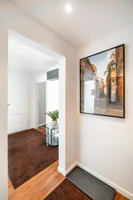 Telewizja i/lub zestaw kina domowego w obiekcie City Centre Luxury Apartment by BookingHost
