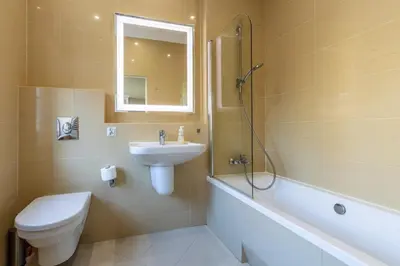 Łazienka w obiekcie Apartament luster i obrazów