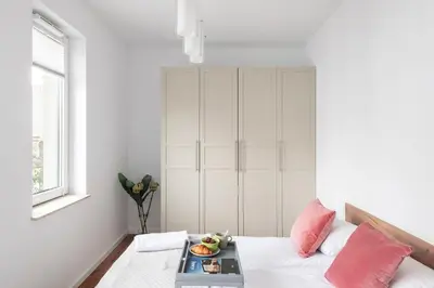 Łóżko lub łóżka w pokoju w obiekcie ShortStayPoland Pustelnicka (B58)