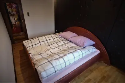 Łóżko lub łóżka w pokoju w obiekcie Dom Stegny