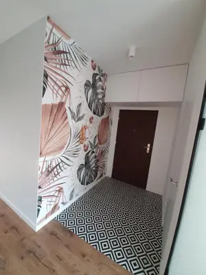 Łóżko lub łóżka w pokoju w obiekcie BIZNES Apart metro Bielany
