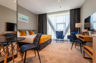 Telewizja i/lub zestaw kina domowego w obiekcie Hotel Sante