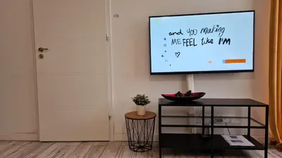 Telewizja i/lub zestaw kina domowego w obiekcie Krolewska Centrum apartament 4X